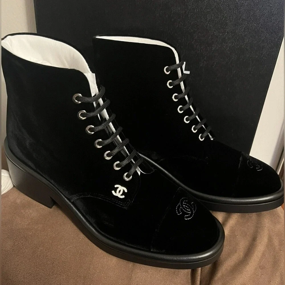 Chanel logo black combat ankle boots